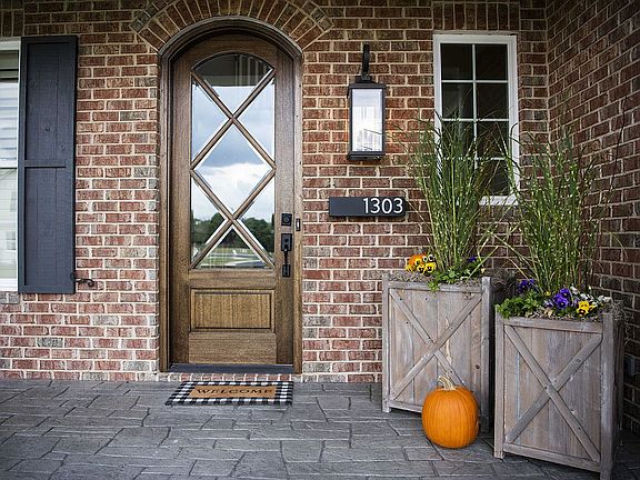 Custom Door says welcome