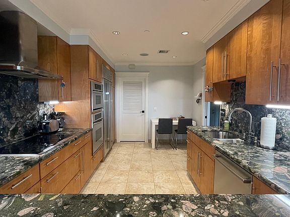 Kitchen - door in back to laundry and pantry