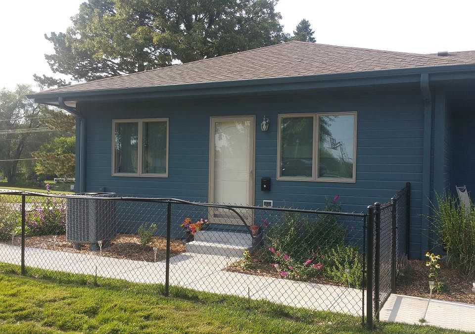 Private entrance, yard and lots of flowers.