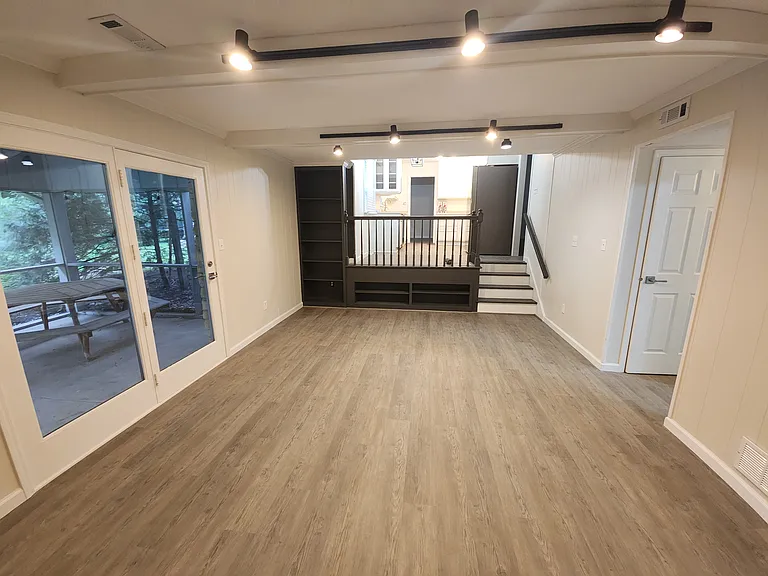 Family Room and kitchen, downstairs hallway (leads to closet/pantry, first level bathroom, Down stairs Bedroom and wash room)
