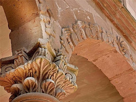 Artisan carved stone  adorns the home throughout.