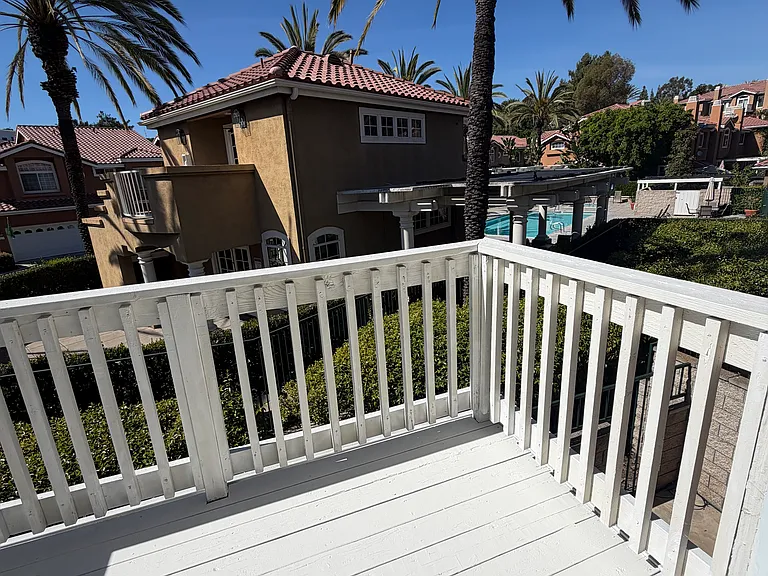 Balcony and view to the pool and Clubhouse