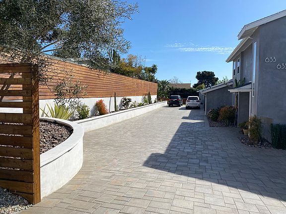 View of paved driveway from the street