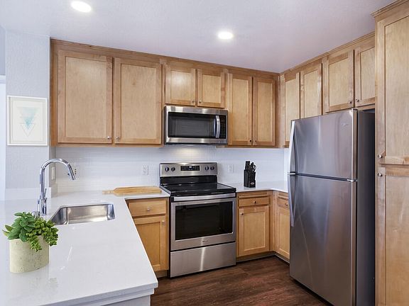 Renovated Package II Kitchen with stainless steel appliances and hard surface flooring