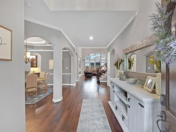 Gorgeous entry features hardwood floors