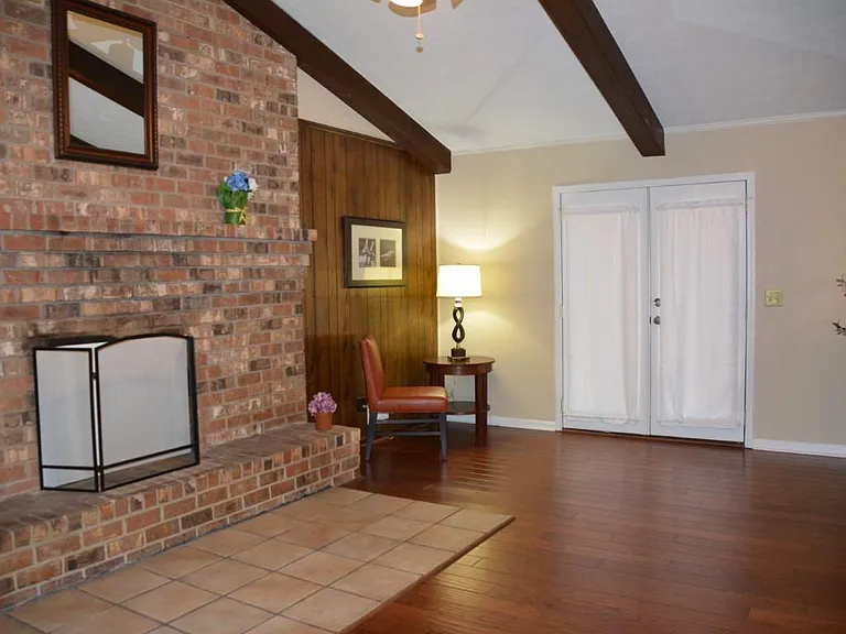 Den with seating area