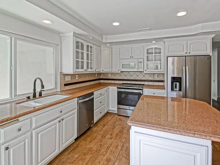 7148 Island Village Dr — Photo 13