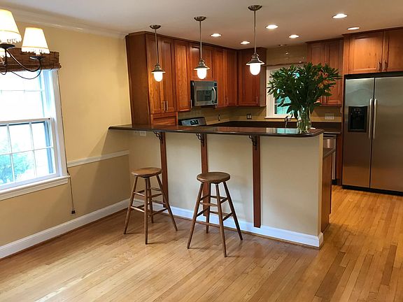Remodeled kitchen with high end features and stainless steel appliances.