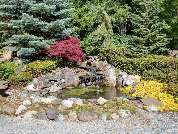 Enjoy the tranquility and peacefulness around the pond and waterfall