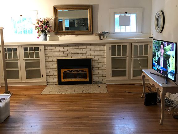 Living room has gas fireplac