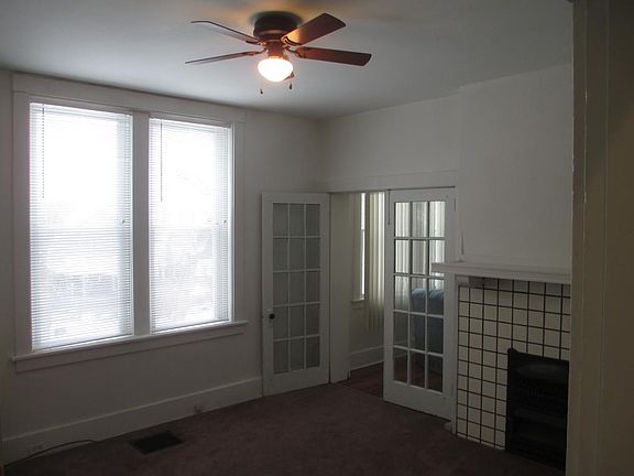 living room with ceiling fan