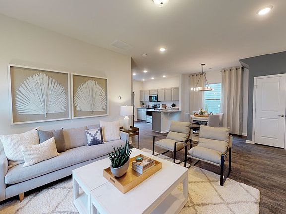 Plenty of space for everyone in the comfortable living room - Model Representation