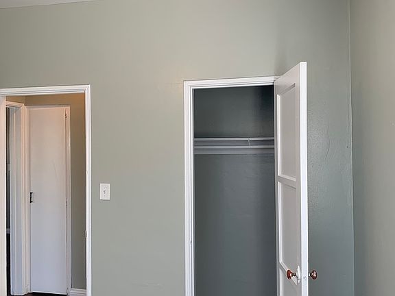 Walk-in closet in bedtoom.