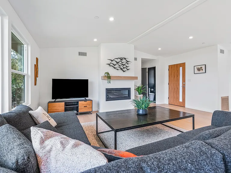 Spacious living room with plenty of seating for everyone