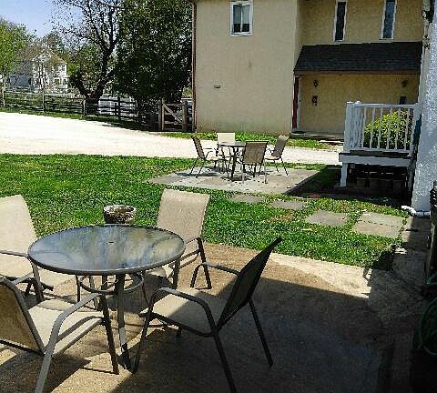 Back yard patio table, chairs for use