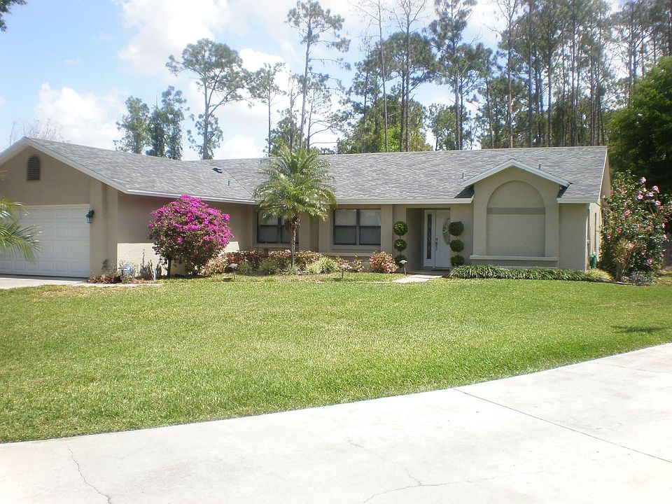 The front of the house - from the driveway of the neighbor on our right.