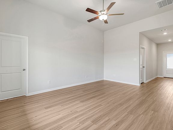 The foyer leads to a large living room