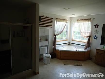 Open floor plan
						:
						Beautiful dark hardwood flooring in the llivingroom and main hallway