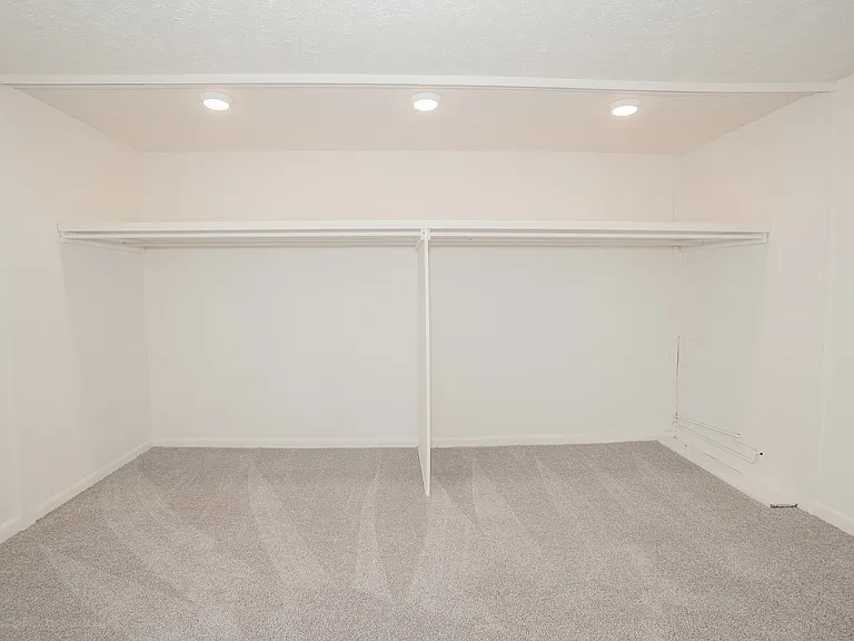 Main Bedroom with Built In Open Closet Storage