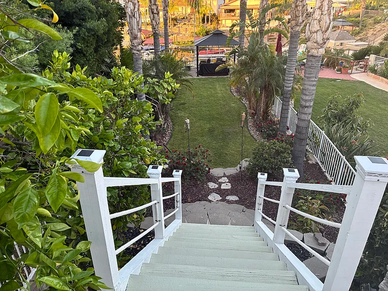 Stairs to private yard and gazebo for lake view