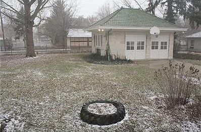 Fenced back yard. 2 car garage with drive through capabilities. Garage also has a drain and water to wash vehicles.