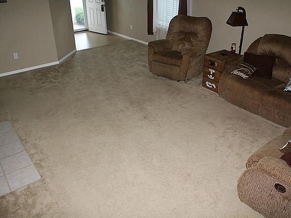 Huge family room with plenty of space for your furniture and for the kids to play!