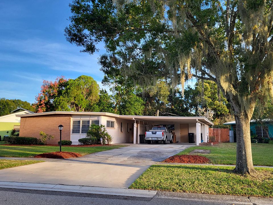 Frontal View of Property showing WIDE entrance ramp, and Double Carport Parking.