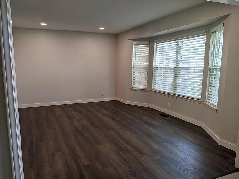 View from the entryway into the first living room