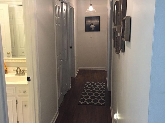 Hallway to upstairs bedrooms and hall bath