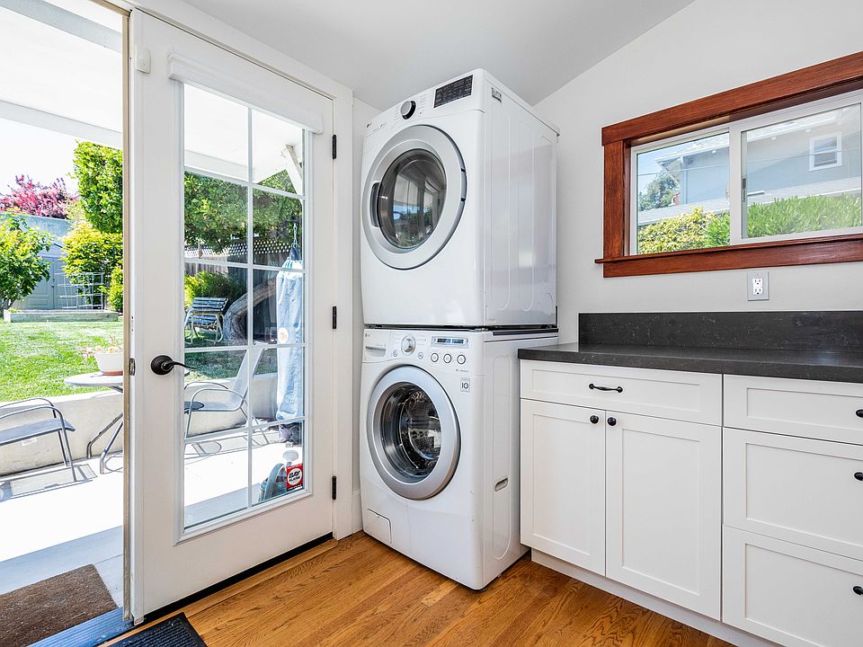 Recently renovated chef's kitchen with plenty of storage, updated stove, dishwasher, refrigerator and washer / dryer.