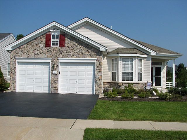 The Mulberry, features stone front with Bay window.