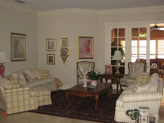 LIVING ROOM HAS FRENCH DOORS TO FAMILY ROOM