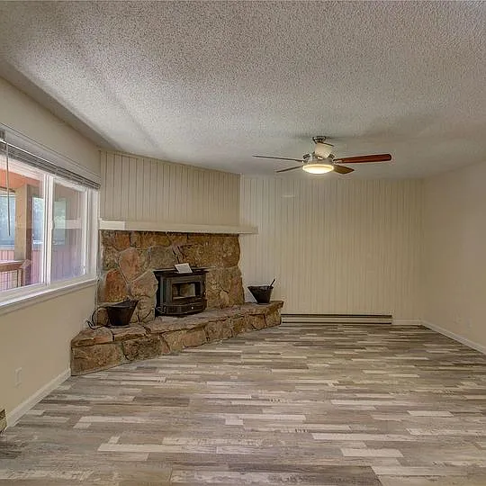 Woodburning fireplace in living room