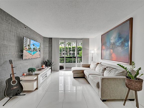 5th image of 3600 Mystic Pointe Dr APT 203