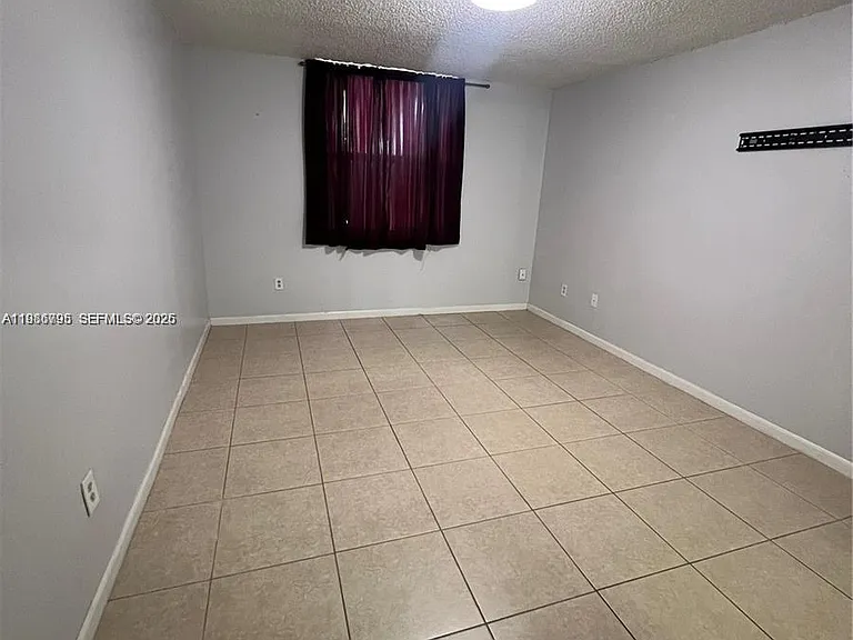8307 SW 142nd Ave #F105 — Photo 12