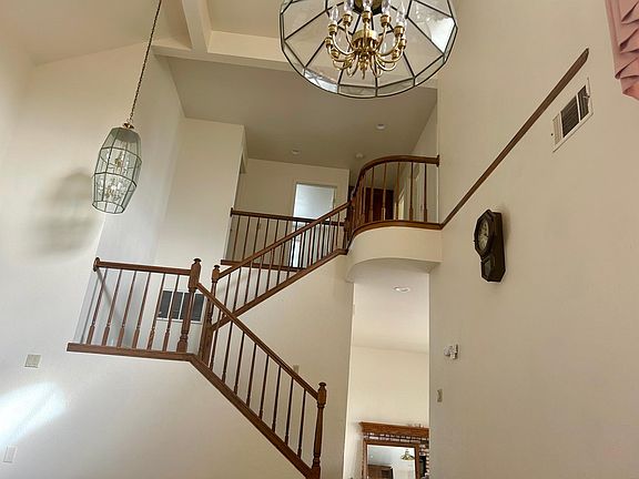 Staircase view from large living room