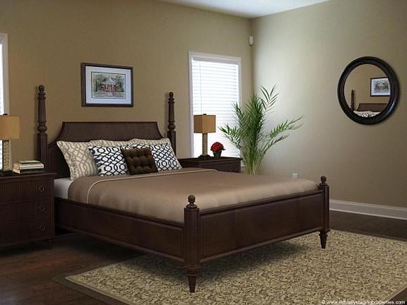 master bedroom with hardwood