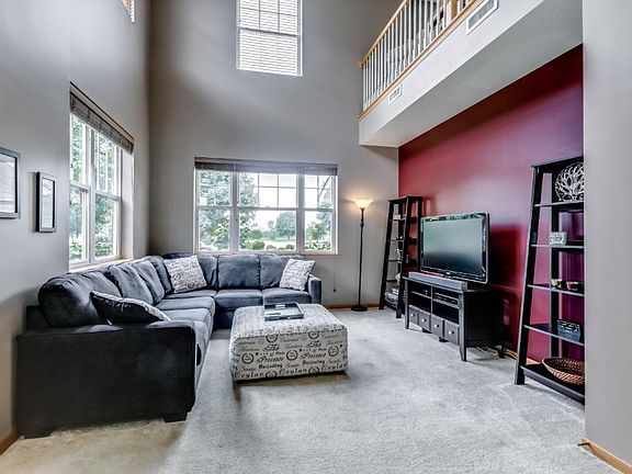 Large, bright living room.  Perfect for entertaining.  $2,000 Carpet Allowance.