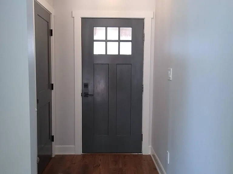 Back door, hall closet, stairs to upper level