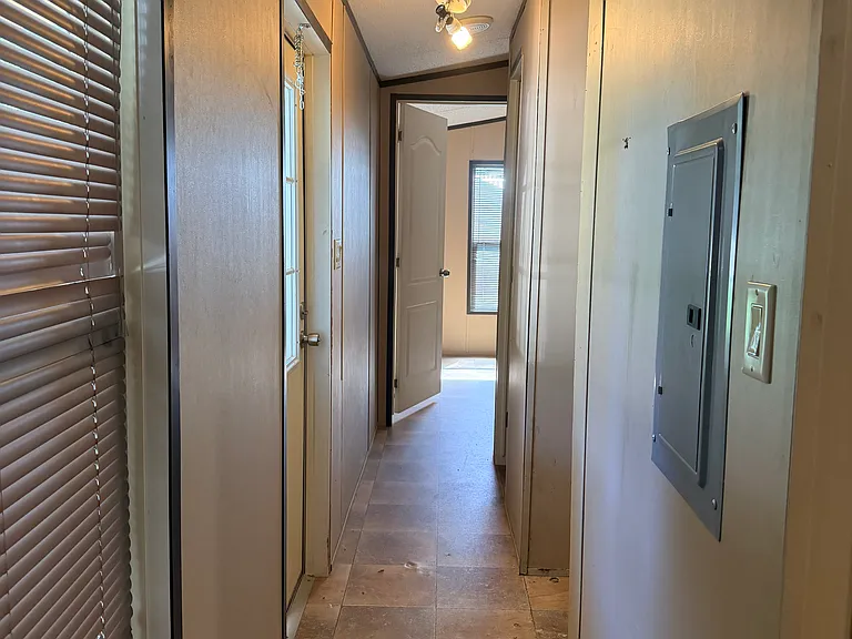 Hallway to second bedroom and the bathroom
