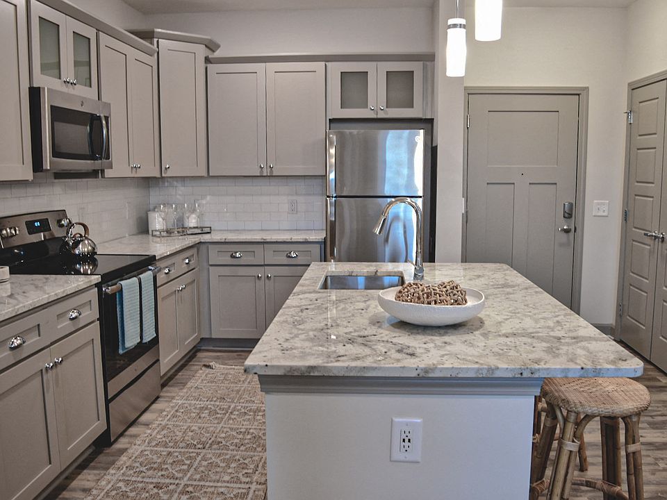 Designer Kitchen with Custom Cabinetry and Granite Counters