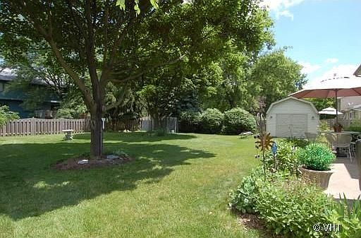 Fenced back yard w/ large shed!