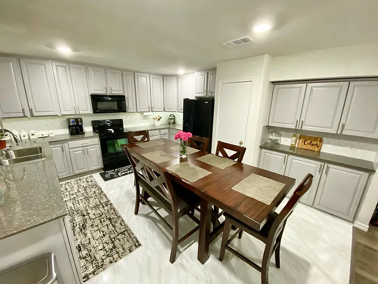 Exceptional large kitchen for homes in this neighborhood, lots of cabinet space with stone tops.