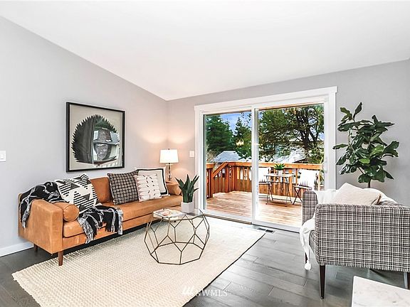 Living room with oversized slider to deck...