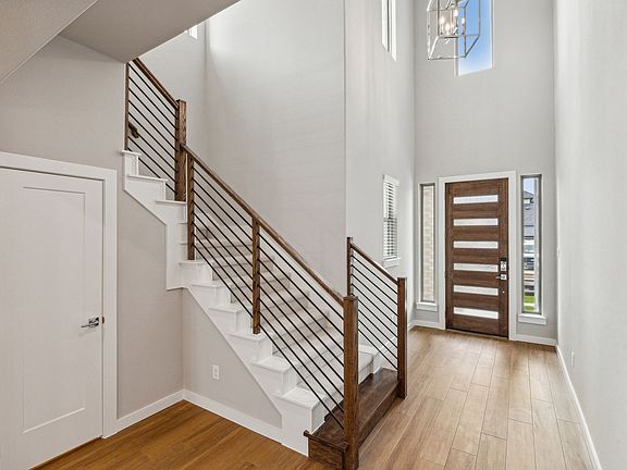 Entryway in the Da Vinci II home plan by Trophy Signature Homes - REPRESENTATIVE PHOTO