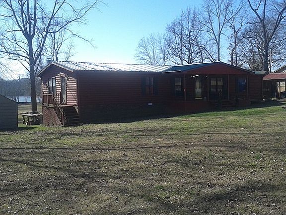 FRONT PORCH SWING
						:
						Covered front porch w/ramp.
