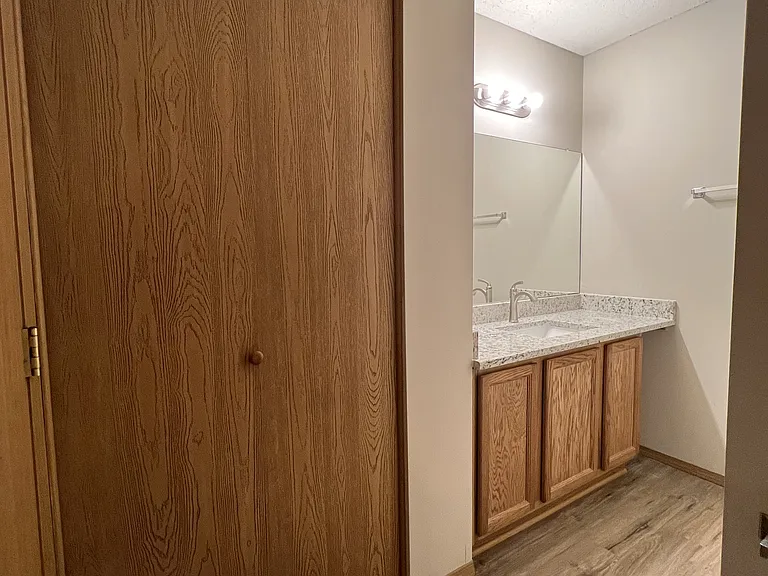 Master private full bath with granite and large storage closet