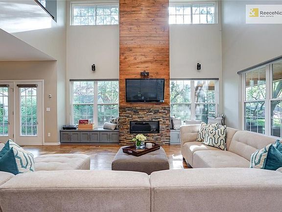 Tons of light, window seats & gas fireplace!