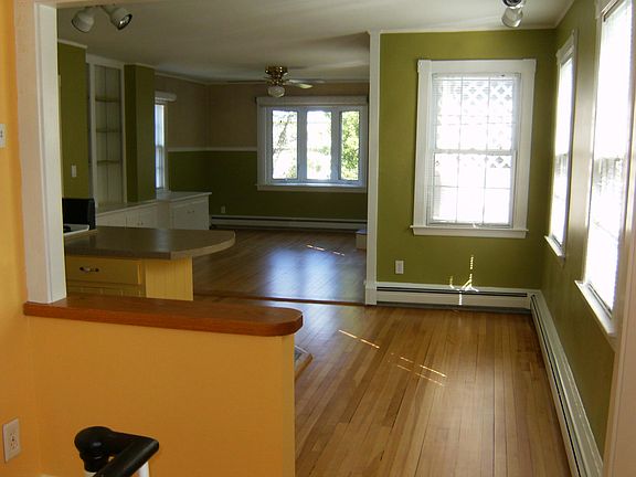 View from the middle of the apt through kitchen into living room.