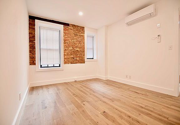 3rd image of 152 W 49th St APT 2F